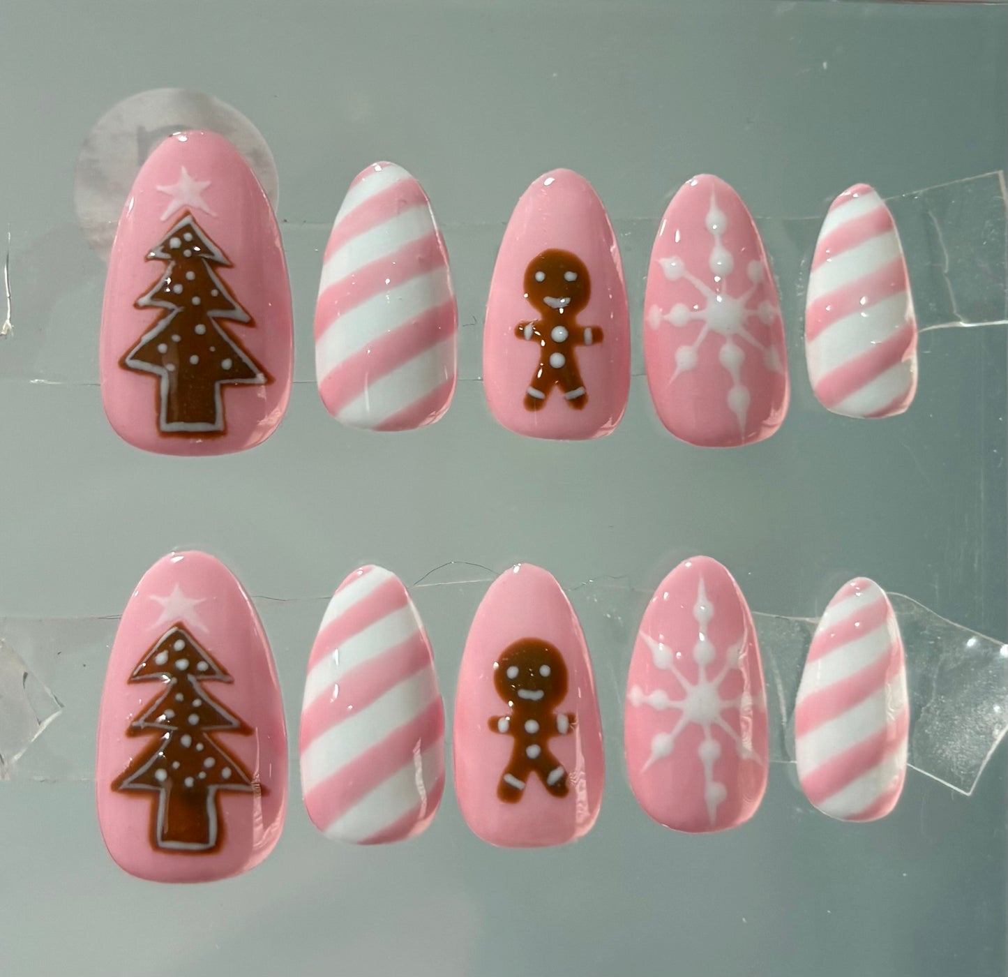 Hand-Painted Gingerbread Holiday Press On Nails: Pink and White Almond Christmas Nails